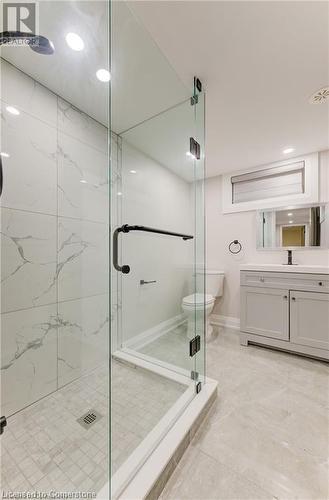 Bathroom with vanity, toilet, and a shower with shower door - 1100 Union Street Unit# 3, Kitchener, ON - Indoor Photo Showing Bathroom