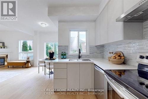 16 Bond Lake Park Street, Richmond Hill, ON - Indoor Photo Showing Kitchen With Fireplace