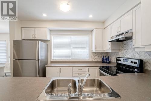 277 Casson Point, Milton, ON - Indoor Photo Showing Kitchen With Double Sink