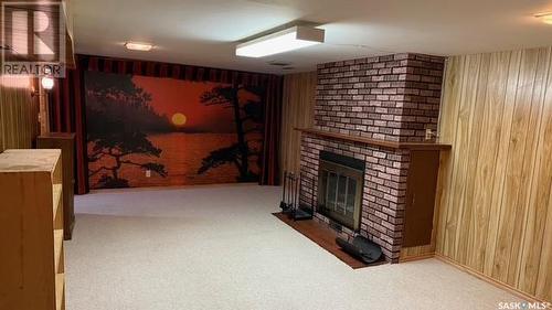 76 31St Street E, Prince Albert, SK - Indoor Photo Showing Other Room With Fireplace