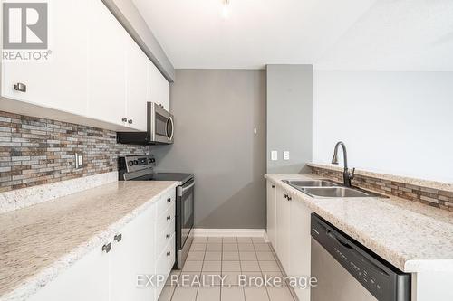 207 - 87 Aspen Springs Drive, Clarington, ON - Indoor Photo Showing Kitchen With Double Sink