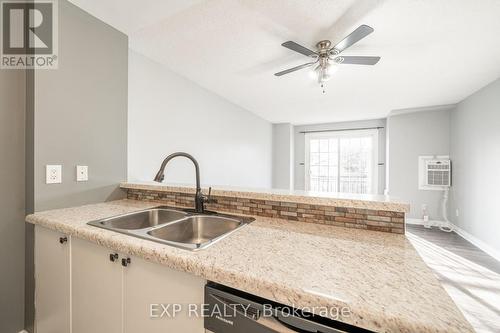 207 - 87 Aspen Springs Drive, Clarington, ON - Indoor Photo Showing Kitchen With Double Sink