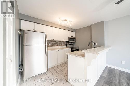 207 - 87 Aspen Springs Drive, Clarington, ON - Indoor Photo Showing Kitchen With Upgraded Kitchen