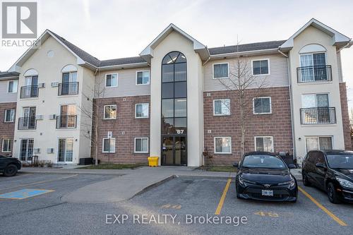 207 - 87 Aspen Springs Drive, Clarington, ON - Outdoor With Facade