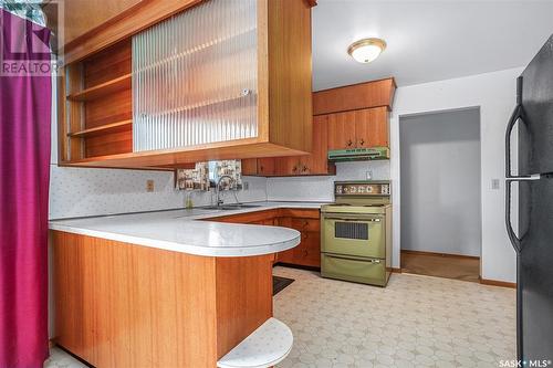 339 Witney Avenue S, Saskatoon, SK - Indoor Photo Showing Kitchen With Double Sink