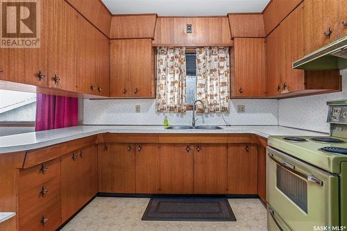 339 Witney Avenue S, Saskatoon, SK - Indoor Photo Showing Kitchen With Double Sink