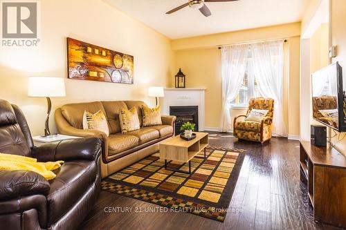 856 Emery Way, Peterborough (Monaghan), ON - Indoor Photo Showing Living Room With Fireplace