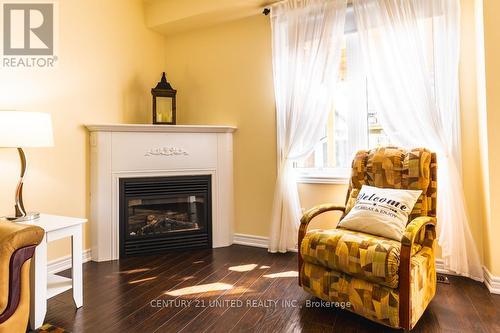 856 Emery Way, Peterborough (Monaghan), ON - Indoor Photo Showing Living Room With Fireplace