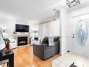 Hall - 515 Rue De La Loire, Sainte-Julie, QC  - Indoor Photo Showing Living Room With Fireplace 