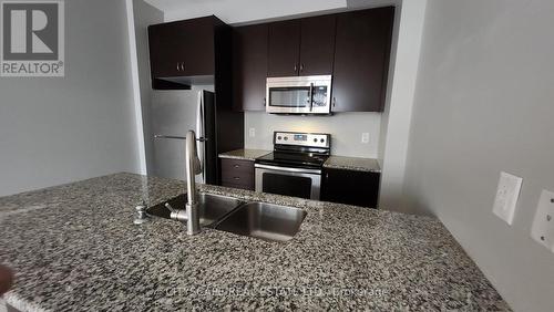 69 - 2435 Greenwich Drive, Oakville, ON - Indoor Photo Showing Kitchen With Stainless Steel Kitchen With Double Sink