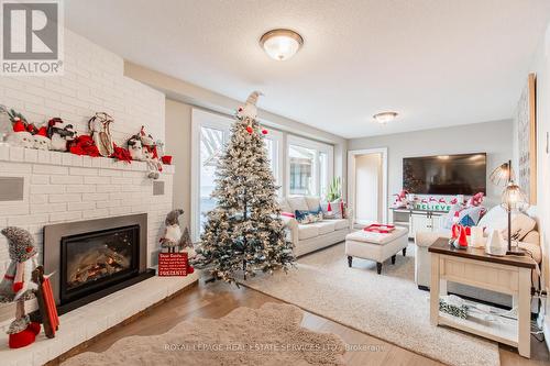 33 Cheval Drive, Grimsby, ON - Indoor Photo Showing Living Room With Fireplace