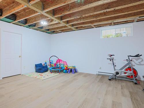 Salle familiale - 668 Rue Des Hautbois, Saint-Jérôme, QC - Indoor Photo Showing Basement