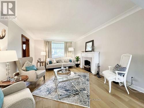 79 Clonmore Drive, Toronto (Birchcliffe-Cliffside), ON - Indoor Photo Showing Living Room With Fireplace