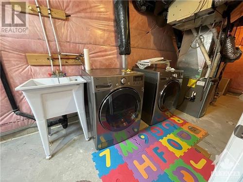 651 Broad Cove Crescent, Barrhaven (7711 - Barrhaven - Half Moon Bay), ON - Indoor Photo Showing Laundry Room