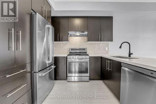 166 - 1890 Rymal Road E, Hamilton, ON - Indoor Photo Showing Kitchen With Stainless Steel Kitchen With Double Sink With Upgraded Kitchen