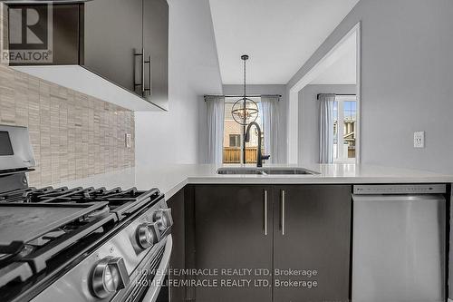 166 - 1890 Rymal Road E, Hamilton, ON - Indoor Photo Showing Kitchen With Double Sink