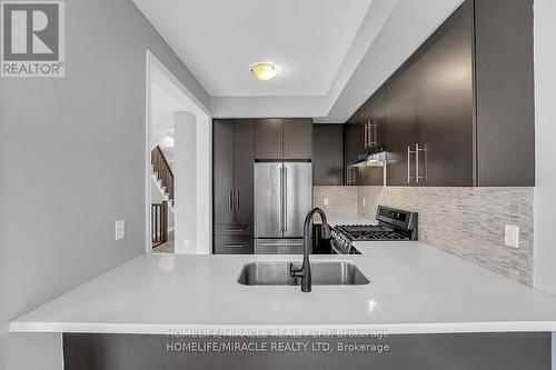 166 - 1890 Rymal Road E, Hamilton, ON - Indoor Photo Showing Kitchen With Stainless Steel Kitchen With Upgraded Kitchen