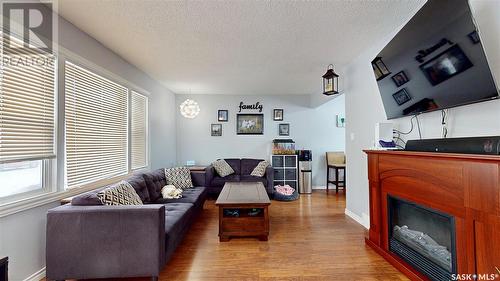 134 Montreal Street N, Regina, SK - Indoor Photo Showing Living Room With Fireplace