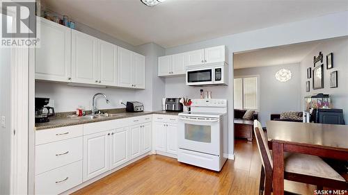 134 Montreal Street N, Regina, SK - Indoor Photo Showing Kitchen With Double Sink