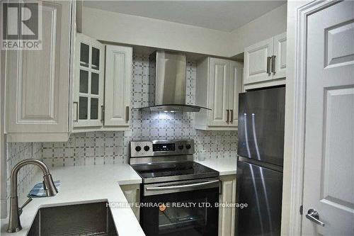 532 - 3888 Duke Of York Boulevard, Mississauga, ON - Indoor Photo Showing Kitchen With Stainless Steel Kitchen With Upgraded Kitchen