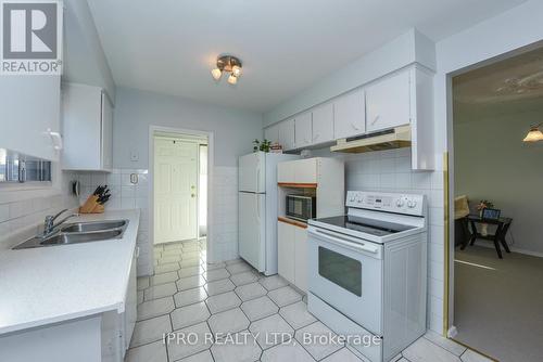 23 Benton Street, Brampton, ON - Indoor Photo Showing Kitchen With Double Sink