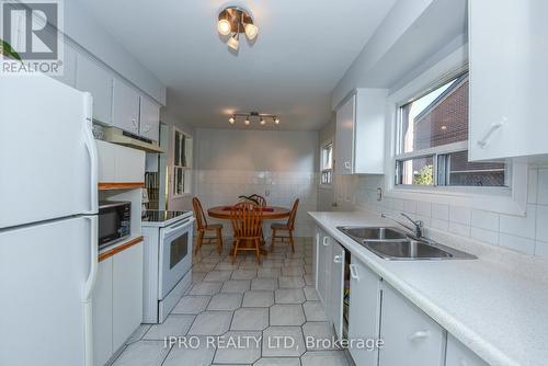 23 Benton Street, Brampton, ON - Indoor Photo Showing Kitchen With Double Sink