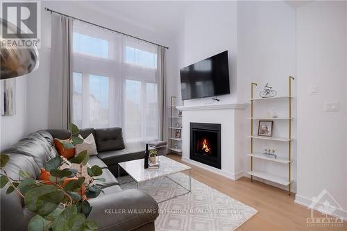 85 Gartersnake Way, Ottawa, ON - Indoor Photo Showing Living Room With Fireplace