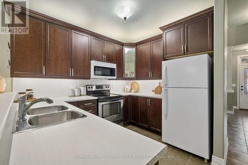 505 - 120 University Avenue E, Cobourg, ON - Indoor Photo Showing Kitchen With Double Sink