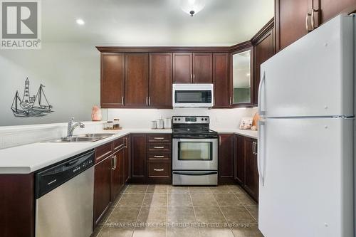 505 - 120 University Avenue E, Cobourg, ON - Indoor Photo Showing Kitchen With Double Sink