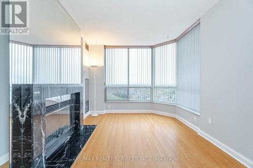 Ph 2502 - 22 Hanover Road, Brampton, ON - Indoor Photo Showing Other Room With Fireplace