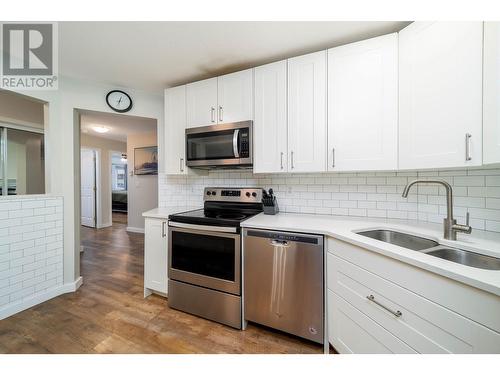 575 Doyle Avenue Unit# 102, Kelowna, BC - Indoor Photo Showing Kitchen With Double Sink