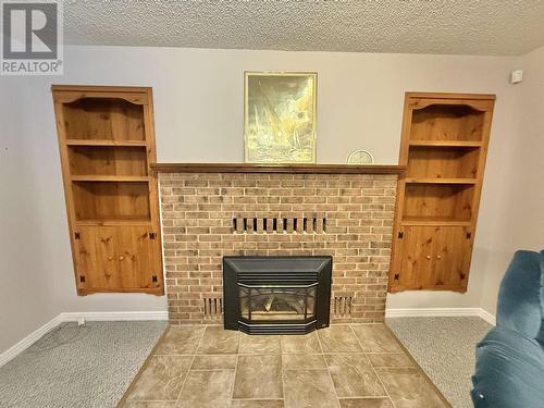 2850 Gavlin Road, Quesnel, BC - Indoor Photo Showing Living Room With Fireplace