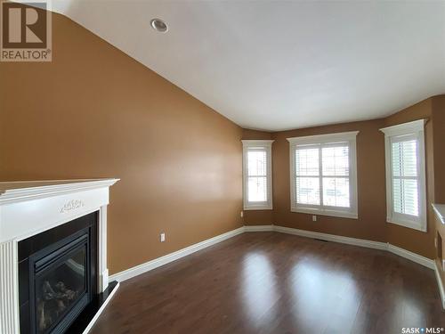 14 Good Spirit Crescent, Yorkton, SK - Indoor Photo Showing Other Room With Fireplace