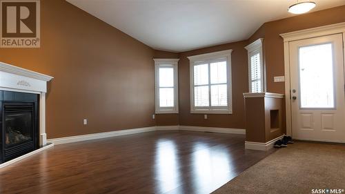 14 Good Spirit Crescent, Yorkton, SK - Indoor Photo Showing Other Room With Fireplace