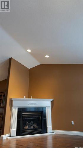 14 Good Spirit Crescent, Yorkton, SK - Indoor Photo Showing Living Room With Fireplace