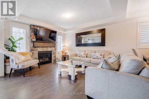 303 Yates Drive, Milton, ON - Indoor Photo Showing Living Room With Fireplace