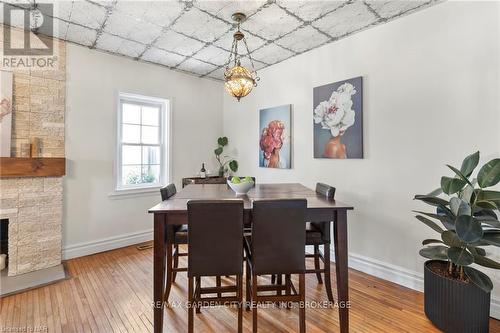 123 Elgin Street W, Welland, ON - Indoor Photo Showing Dining Room With Fireplace