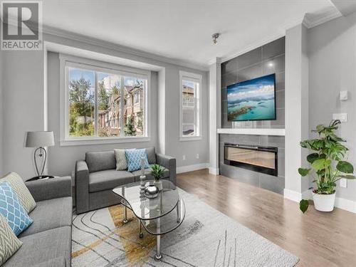 141 10151 240 Street, Maple Ridge, BC - Indoor Photo Showing Living Room With Fireplace