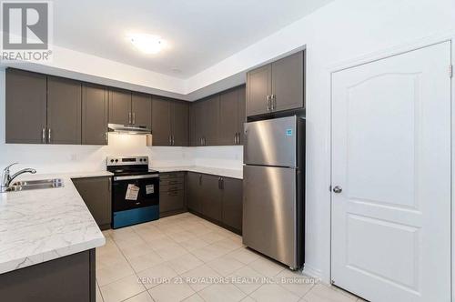 7 Tiveron Avenue, Caledon, ON - Indoor Photo Showing Kitchen With Double Sink