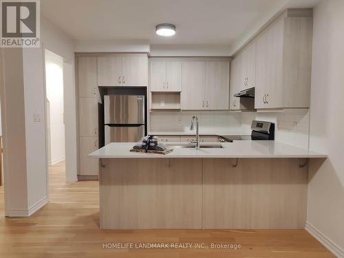 3030 Bramall Gardens, Oakville, ON - Indoor Photo Showing Kitchen With Double Sink