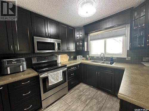 65 Jubilee Drive, Humboldt, SK - Indoor Photo Showing Kitchen With Double Sink