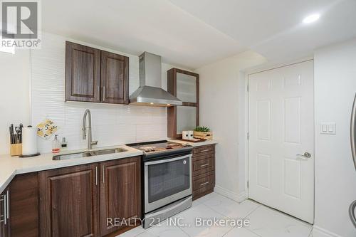 23 Covina Road, Brampton, ON - Indoor Photo Showing Kitchen With Double Sink