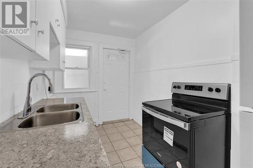 1094 Lincoln Unit# 4, Windsor, ON - Indoor Photo Showing Kitchen With Double Sink