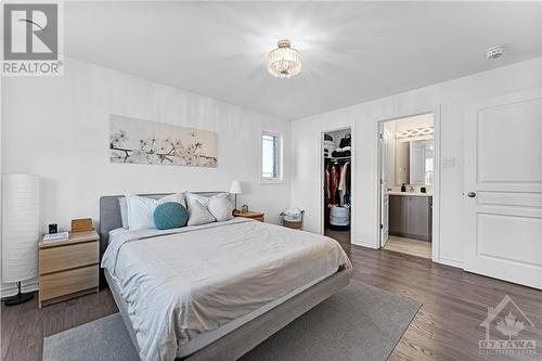 Primary bedroom with walk in closet and Ensuite - 365 Tribeca Private Unit#8, Ottawa, ON - Indoor Photo Showing Bedroom