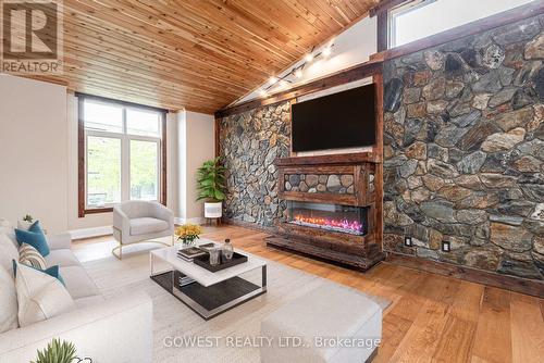 20 Tasker Street, St. Catharines, ON - Indoor Photo Showing Living Room With Fireplace