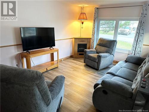 28 Laura Lane, Moncton, NB - Indoor Photo Showing Living Room With Fireplace