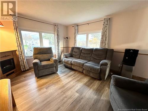 28 Laura Lane, Moncton, NB - Indoor Photo Showing Living Room With Fireplace