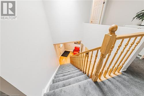 Stairway featuring carpet flooring - 145 Dragoon Drive, Hamilton, ON - Indoor Photo Showing Other Room