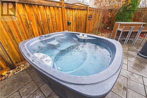 View of pool with a bar and a hot tub - 145 Dragoon Drive, Hamilton, ON - Outdoor