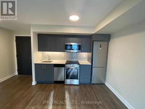 515 - 38 Monte Kwinter Court, Toronto, ON - Indoor Photo Showing Kitchen